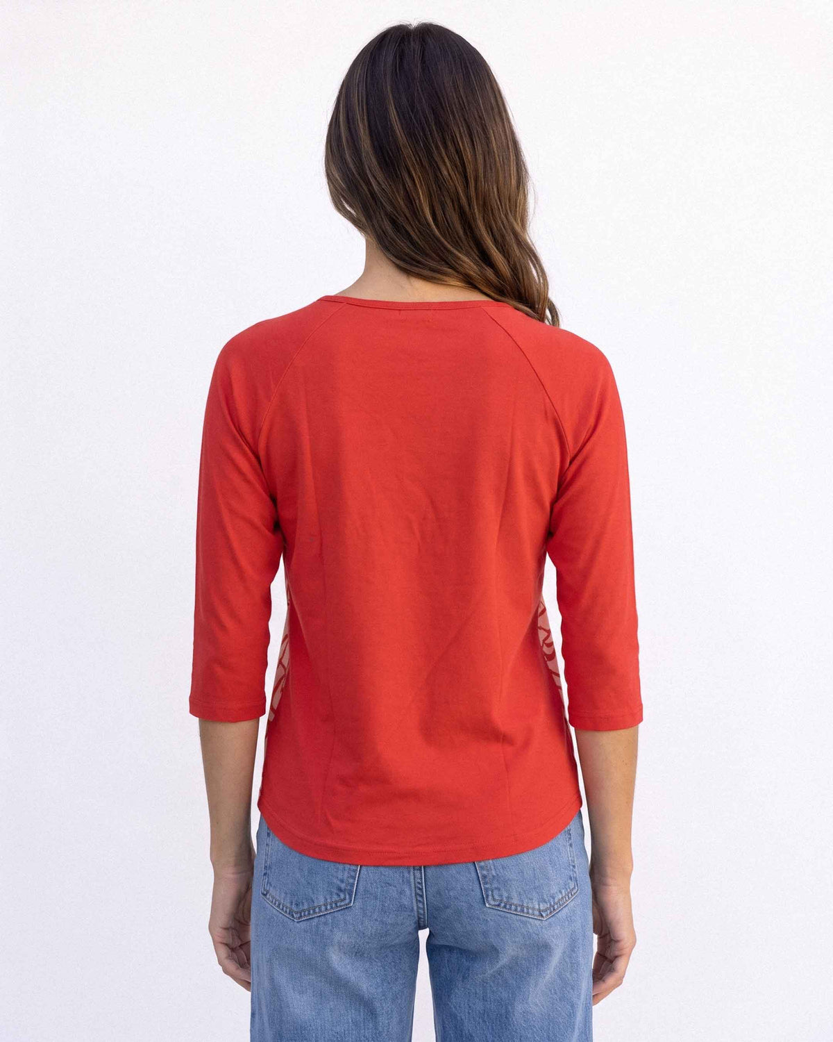 Polera Symor Agra Estampado, color rojo y rosa